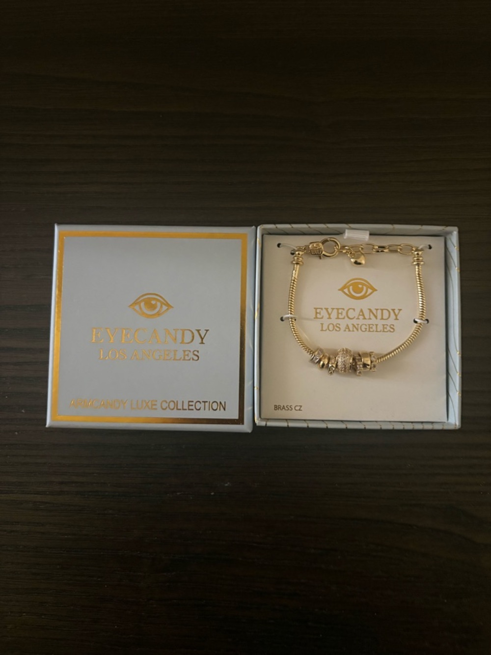 NEW Eye Candy gold charm bracelet